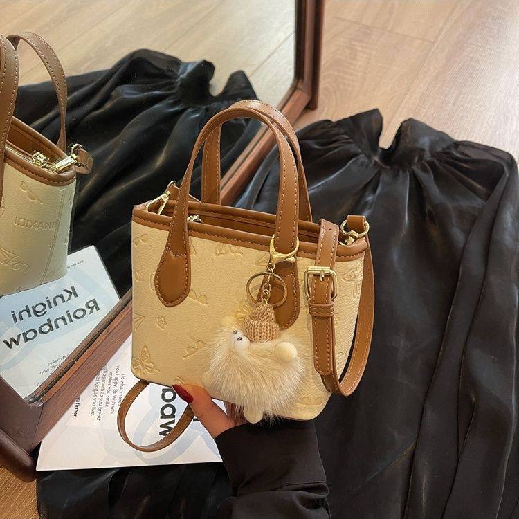 今年流行爆款小包包女春夏2025新款百搭斜挎包韩版手提迷你水桶包,淘宝优惠券,粉丝福利购,淘宝优惠卷