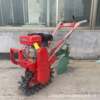 Household small tillage machine chain rail climbing non-slip plow machine orchard greenhouse narrow spacing weeding trenching machine