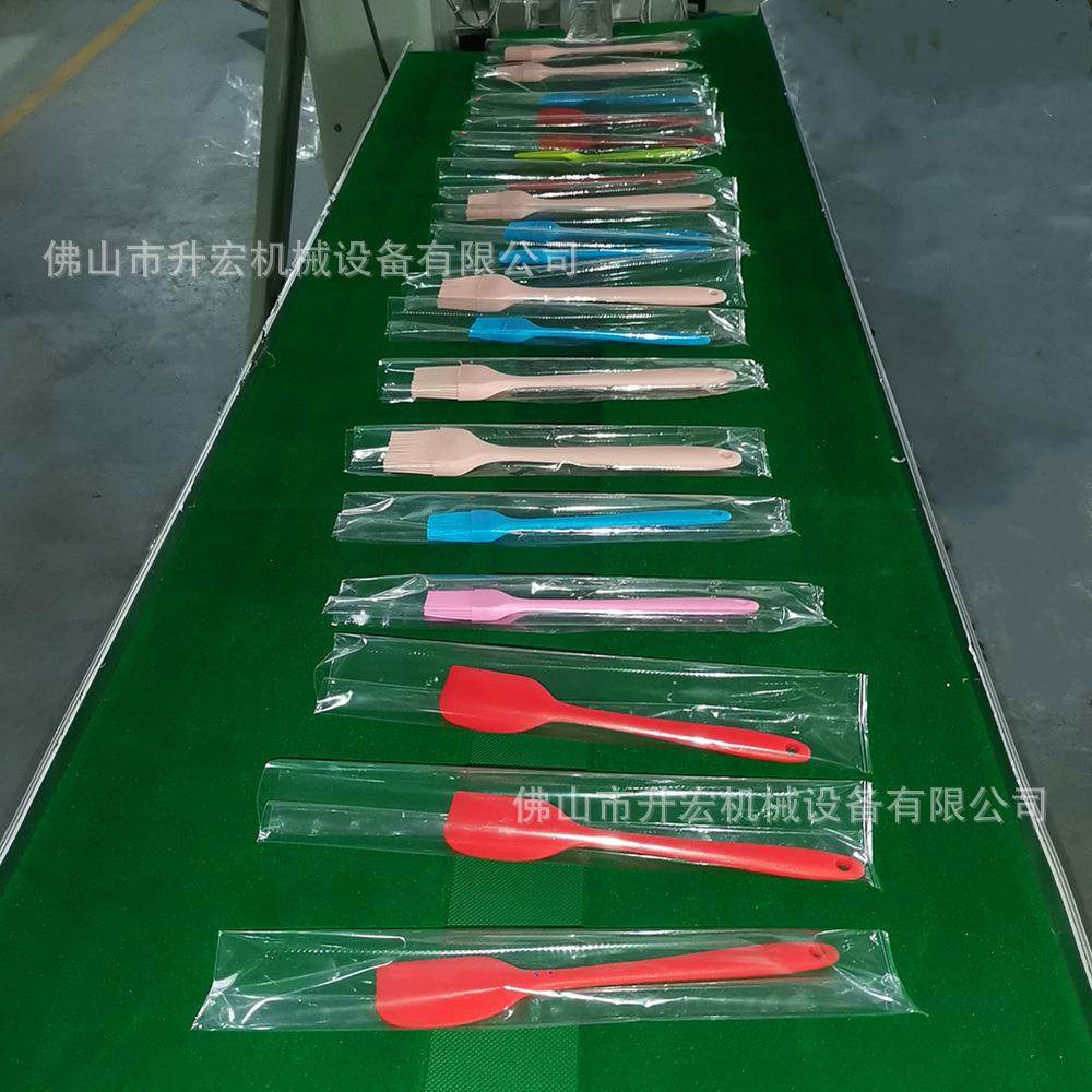 佛山包装机基地厨房勺子包装机漏勺封口机硅胶厨具自动包装机,淘宝优惠券,粉丝福利购,淘宝优惠卷
