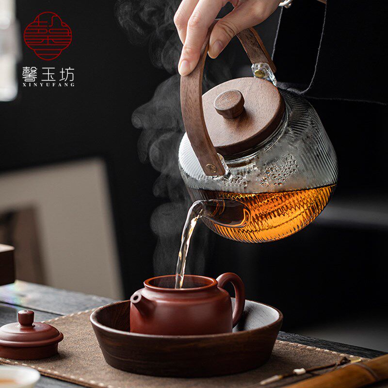 Light luxury walnut electric ceramic stove, heat-resistant glass lifting beam kettle, tea making set around the stove