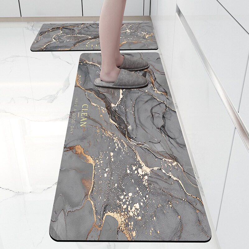 Kitchen floor mats are water-absorbent, oil-proof and non-slip diatom mud floor mats, long strips of waterproof and dirt-resistant carpets, no-wash and wipe-in door mats