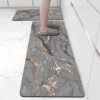 Kitchen floor mats are water-absorbent, oil-proof and non-slip diatom mud floor mats, long strips of waterproof and dirt-resistant carpets, no-wash and wipe-in door mats