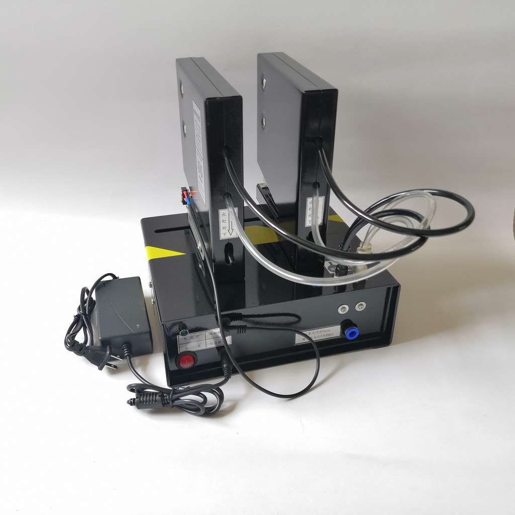 Double-head pneumatic chuck hanging tag bubble shell automatic stapler