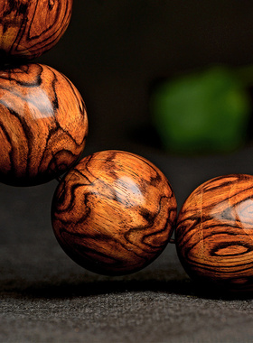 星玺海南黄花梨手串鬼眼鬼脸对眼