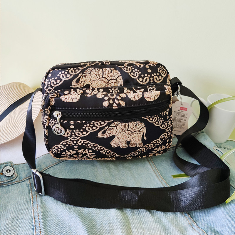 轻便布包女2024新款潮百搭印花迷你小包中年妈妈包牛津帆布斜挎包,淘宝优惠券,粉丝福利购,淘宝优惠卷