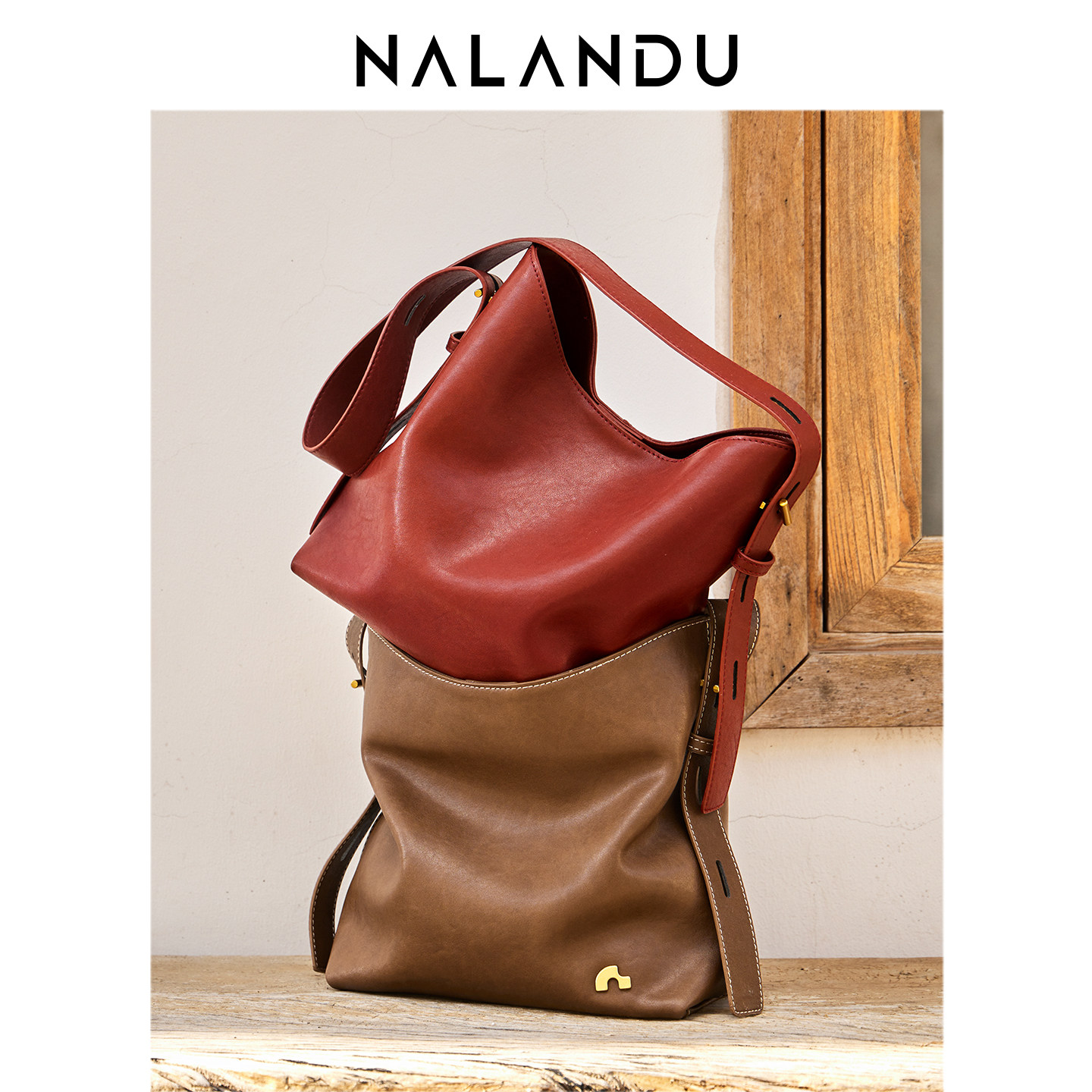 纳兰杜包包女士2025新款秋水桶包大容量斜挎包女包通勤真皮单肩包,淘宝优惠券,粉丝福利购,淘宝优惠卷