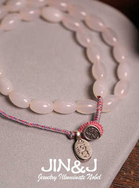 荔枝冻多宝编织手串草莓粉晶原创