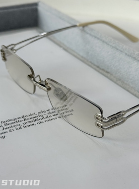 欧美时髦辣妹风茶色金属无框墨镜