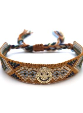 哥伦比亚风手工编织民族风彩色流苏幸运手绳男女织带微镶笑脸手链