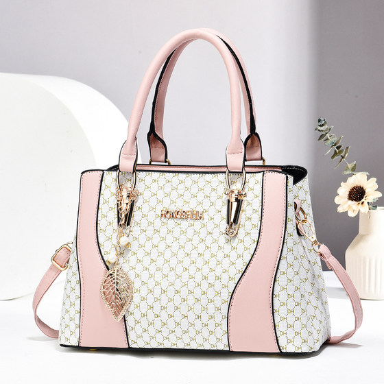 Textured and elegant women's hand-held crossbody bag 2026 new large-capacity middle-aged mother bag commuting versatile tote bag
