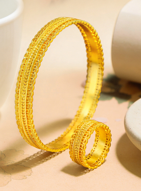 镀黄金色镂空花丝腰缠万贯戒指