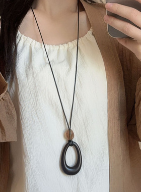 长款黑皮绳复古镂空椭圆吊坠项链