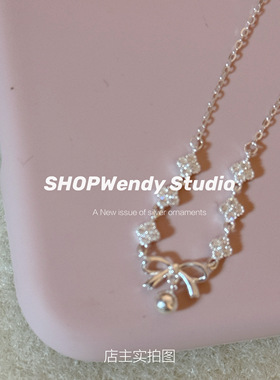 S999足银蝴蝶结四叶花毛衣链