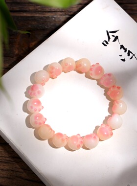 时尚简约炭烧樱花粉猫爪手链