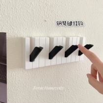 Creative Piano Hook Free to punch the home wall Wall Sticking Hook Ins black and white slips into the back of the door GENGUAN WALL HANGING