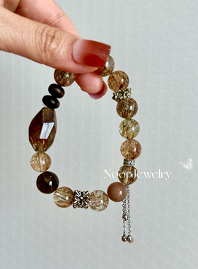 原创天然黑金超七手串男女士清透顺发骨干发丝金闪黑超七水晶手链