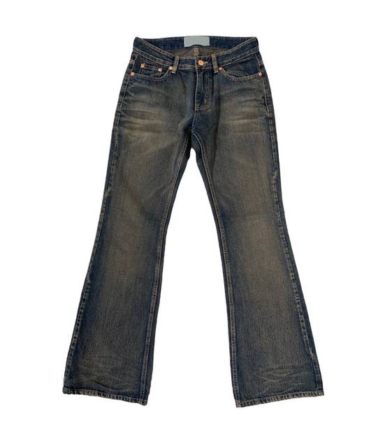 Vintage distressed ລ້າງ trousers denim ວ່າງ