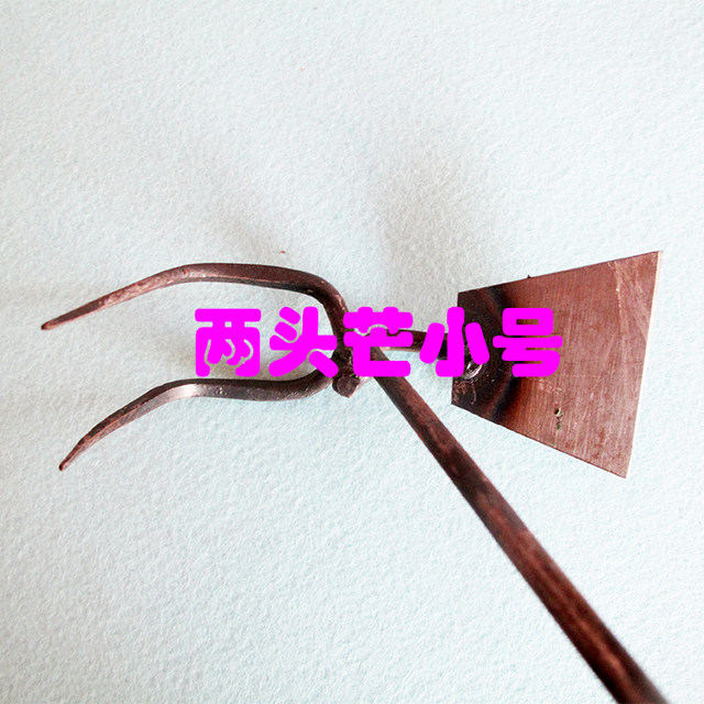 Two busy rakes and hoe agricultural and gardening tools for growing vegetables, weeding, harvesting vegetables, plowing soil, loosening soil and digging holes