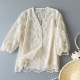 ການອອກແບບ niche beige see-through embroidery temperament short top ເສື້ອ lace high-end ຂອງແມ່ຍິງທີ່ມີ suspenders