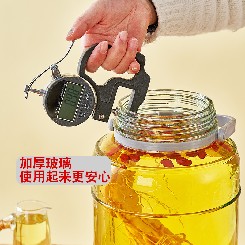 Thickened glass sealed wine bottle with faucet