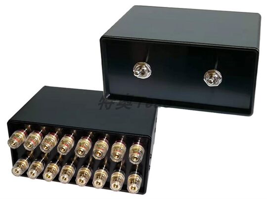 Two power amplifiers and two pairs of speakers with two inputs and two outputs