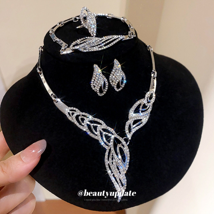 European and American cross-border diamond-encrusted oval earrings, rings, bracelets, necklaces, light luxury and high-end niche clavicle chain jewelry sets