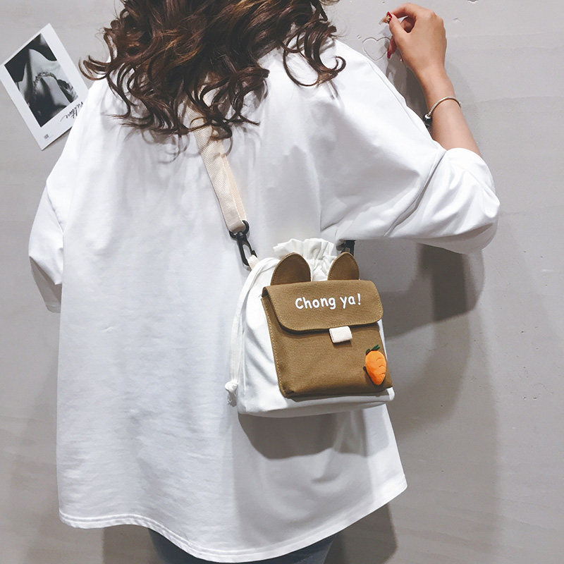 迷你帆布小包包女2025新款女孩可爱手机水桶包学生百搭单肩斜挎包,淘宝优惠券,粉丝福利购,淘宝优惠卷