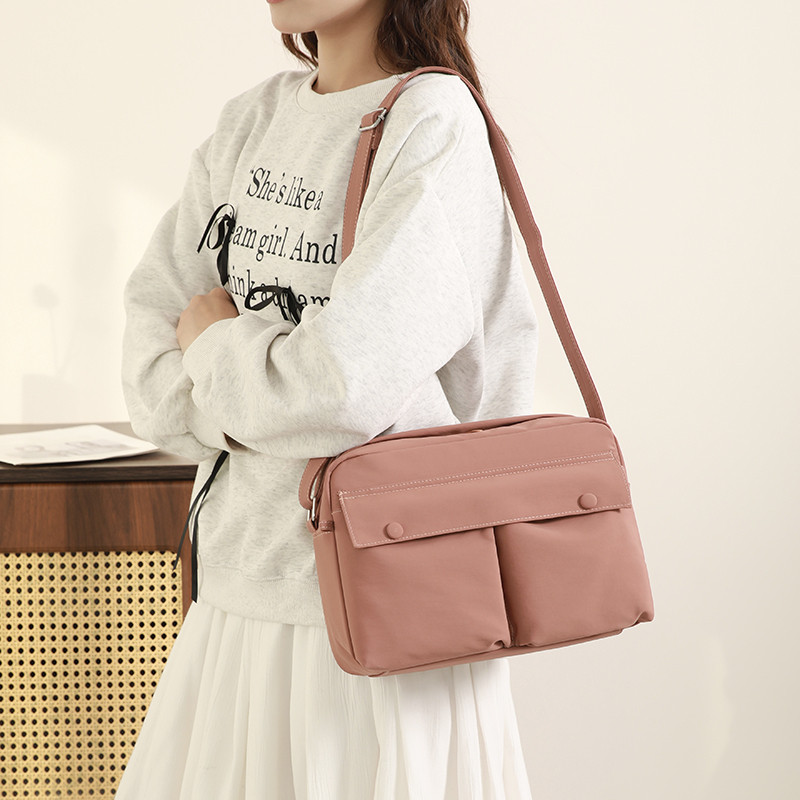 2026新款春夏休闲尼龙布包多口袋帆布斜挎包女轻便百搭通勤邮差包,淘宝优惠券,粉丝福利购,淘宝优惠卷