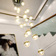 Light luxury, simple and creative ball staircase chandelier