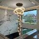 Large chandelier light luxury lamp in the living room of the duplex floor of the villa