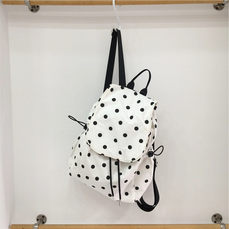 小脏柜 新款波点双肩包时尚轻便小众书包翻盖抽绳流行女包上课包,淘宝优惠券,粉丝福利购,淘宝优惠卷
