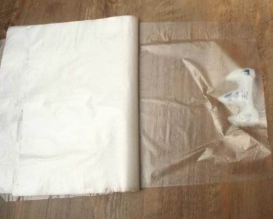 Shampoo waterproof membrane shoulder apron waterproof shoulder pad plastic personalized bag disposable hair salon earmuffs shampoo wet paper cloth