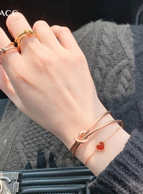 欧美风18k金钛钢打结情侣手环