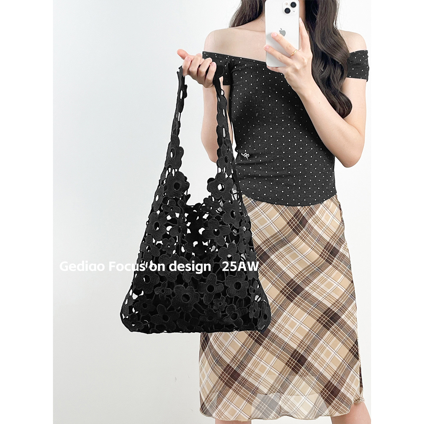 Light luxury niche simple black flower hollow bag for women