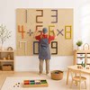 Kindergarten studio background wall solid wood perforated board