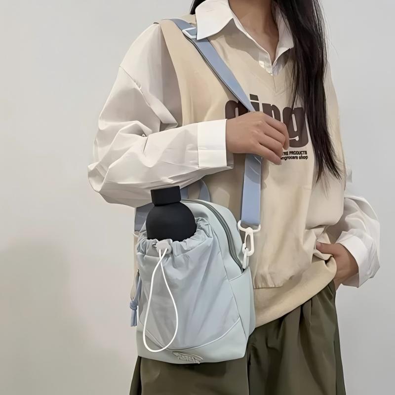 Niche design water cup bag mobile phone bag water bottle bag water cup portable bag casual cute one-shoulder cross-body small bag for women