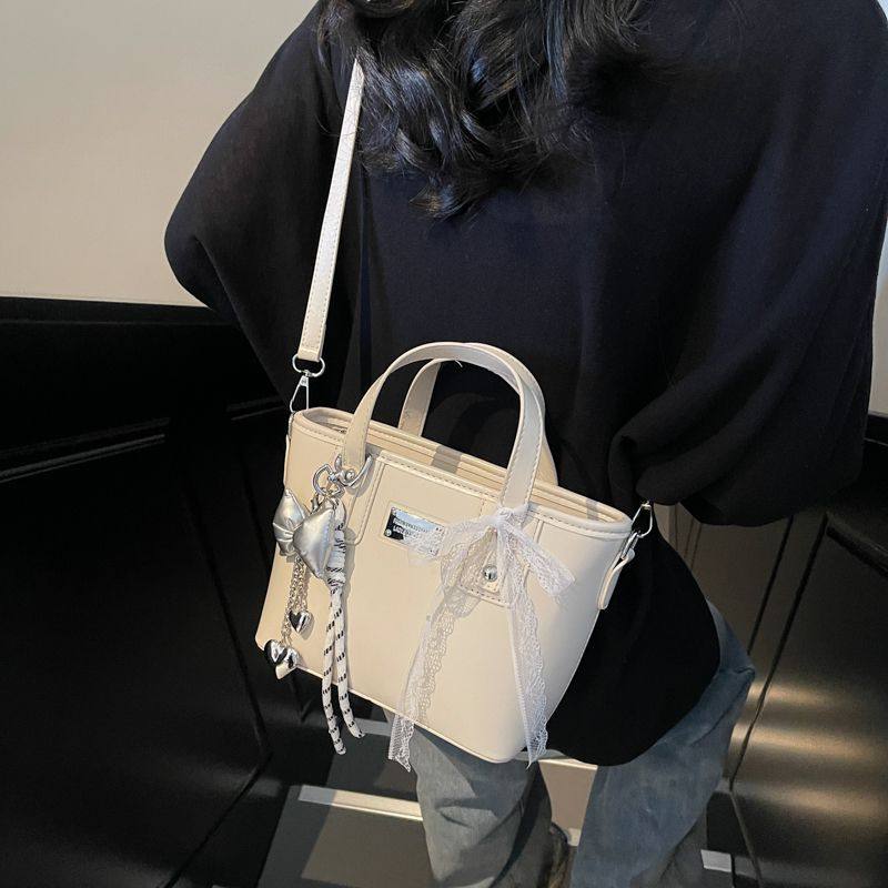 高级感小包包女2025新款时尚百搭斜挎休闲流行爆款通勤手提水桶包,淘宝优惠券,粉丝福利购,淘宝优惠卷