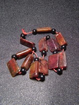 The Han Dynasty local jade belt Zhu sand red Qintong Tiankong Triangle jade Cong ler string