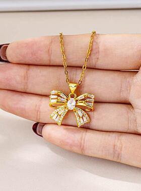 新款锆石蝴蝶结戒指+沙金项链