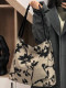Niche jacquard canvas bag large capacity crossbody armpit bag