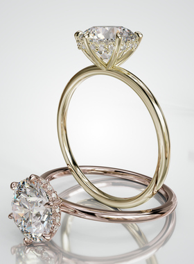 壹钻18K金圆形主石围镶光晕戒指