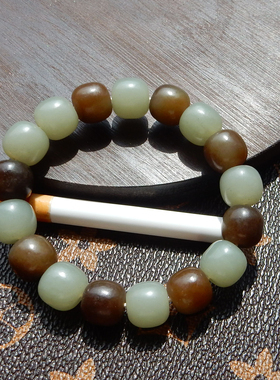 新疆且末蓝糖双色12mm老型珠手串