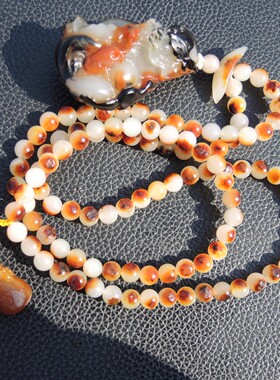 方言镇店之宝罕见古河道老熟三色黑红沁白玉籽料生肖火龙吊坠子R