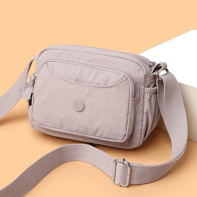 新款时尚百搭牛津布单肩斜挎包女休闲尼龙旅游包包高级设计感妈妈,淘宝优惠券,粉丝福利购,淘宝优惠卷