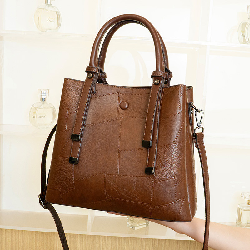 香港代购真皮包包女2025新款潮手提包大容量水桶包复古单肩斜挎包,淘宝优惠券,粉丝福利购,淘宝优惠卷