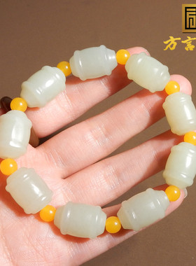 新疆无结构且末料带翠色玉鼓珠串