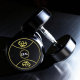 A pair of fixed cast iron dumbbells for gym use at home