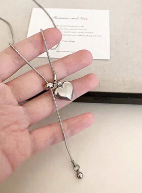 简约银色爱心吊坠项链女秋冬轻奢高级感钛钢抽拉式长款毛衣链配饰