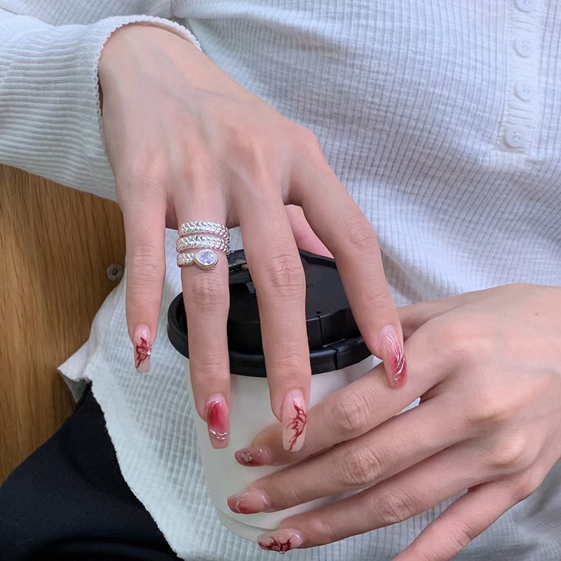 South Korea Dongdaemun S925 all-over sterling silver heavy industry water drop zircon three-layer snake-shaped wheat ear ring for women