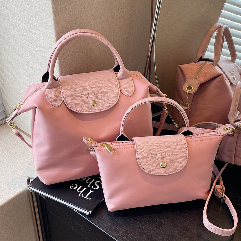 高级质感尼龙包包女包2025新款休闲斜挎小方包大容量百搭通勤包,淘宝优惠券,粉丝福利购,淘宝优惠卷